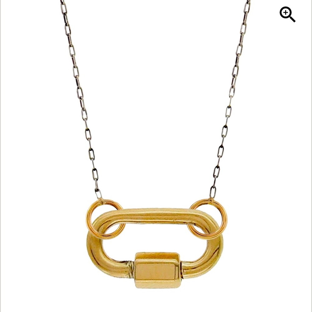 Marla Aaron Baby lock. Very good condition. Guaranteed Authentic.